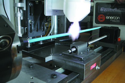 Plasma treating for medical devices The plasma system prepares medical devices for printing.