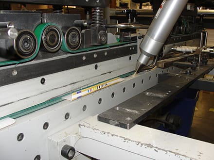evergo-treating-carton-glue-flap Eco-conscious carton maker Evergo Packaging found a way to switch from solvent- to water-based adhesives with Enercon's Blown Ion Series.