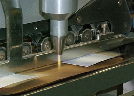 gbp-treating-glue-flap Enercon's Blown-ion Plasma Treater has increased productivity, product quality and reduced operation costs for Green Bay Packaging's Folding Carton Division.