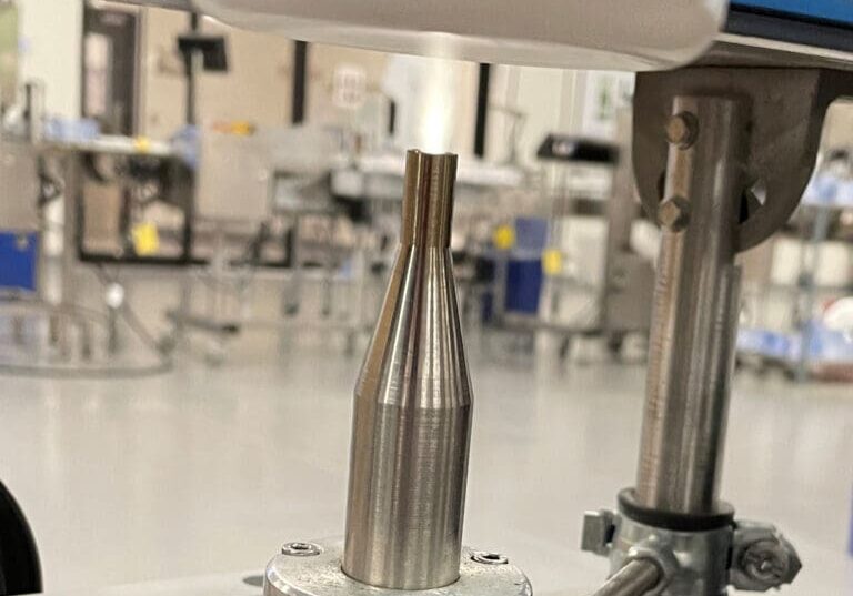 Biovation Labs plasma treats bottles prior to printing lot codes.